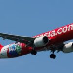 பறக்கும் விமானத்தில் கதவை திறக்க முற்பட்ட பயணியால் பரபரப்பு!